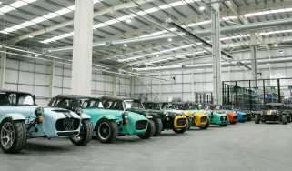 Multiple Caterhams parked in factory